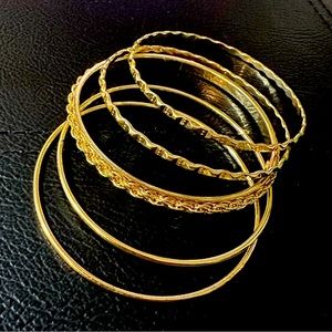 Gold colored bangle bracelets